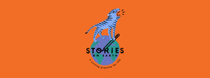 stories on earth logo colorfully illustrated tiger on earth roaring on an orange background